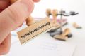 Foto: Stempel mit Sozialversicherung beschriftet